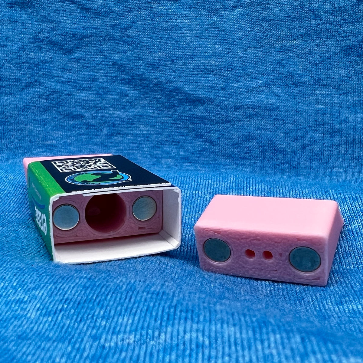 The eraser scent work hide shown opened.  From this angle you can see the magnets used to hold the hide closed as well as the chamber for adding odor. 